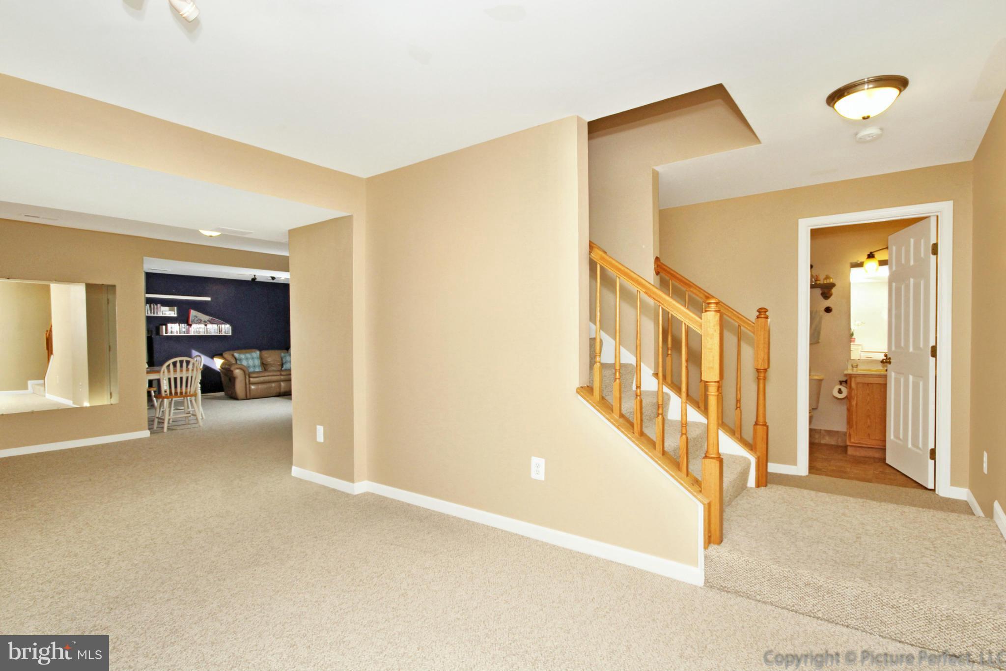 9014 Bealls Farm Road Frederick, MD 21704 - Photo 17 of 30 a view of a hallway with a livingroom and entryway