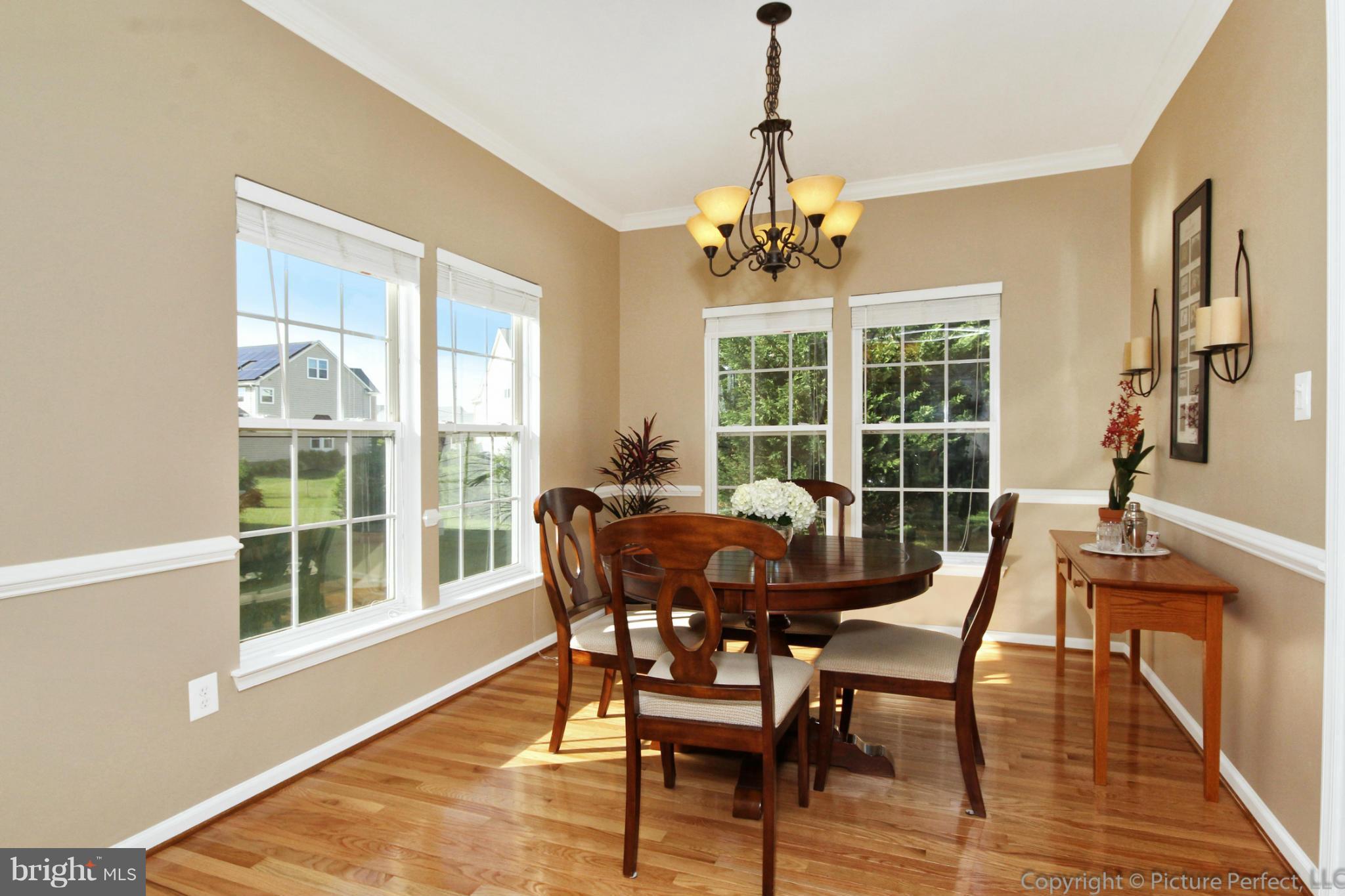 9014 Bealls Farm Road Frederick, MD 21704 - Photo 7 of 30 a view of a dining room with furniture window and outside view