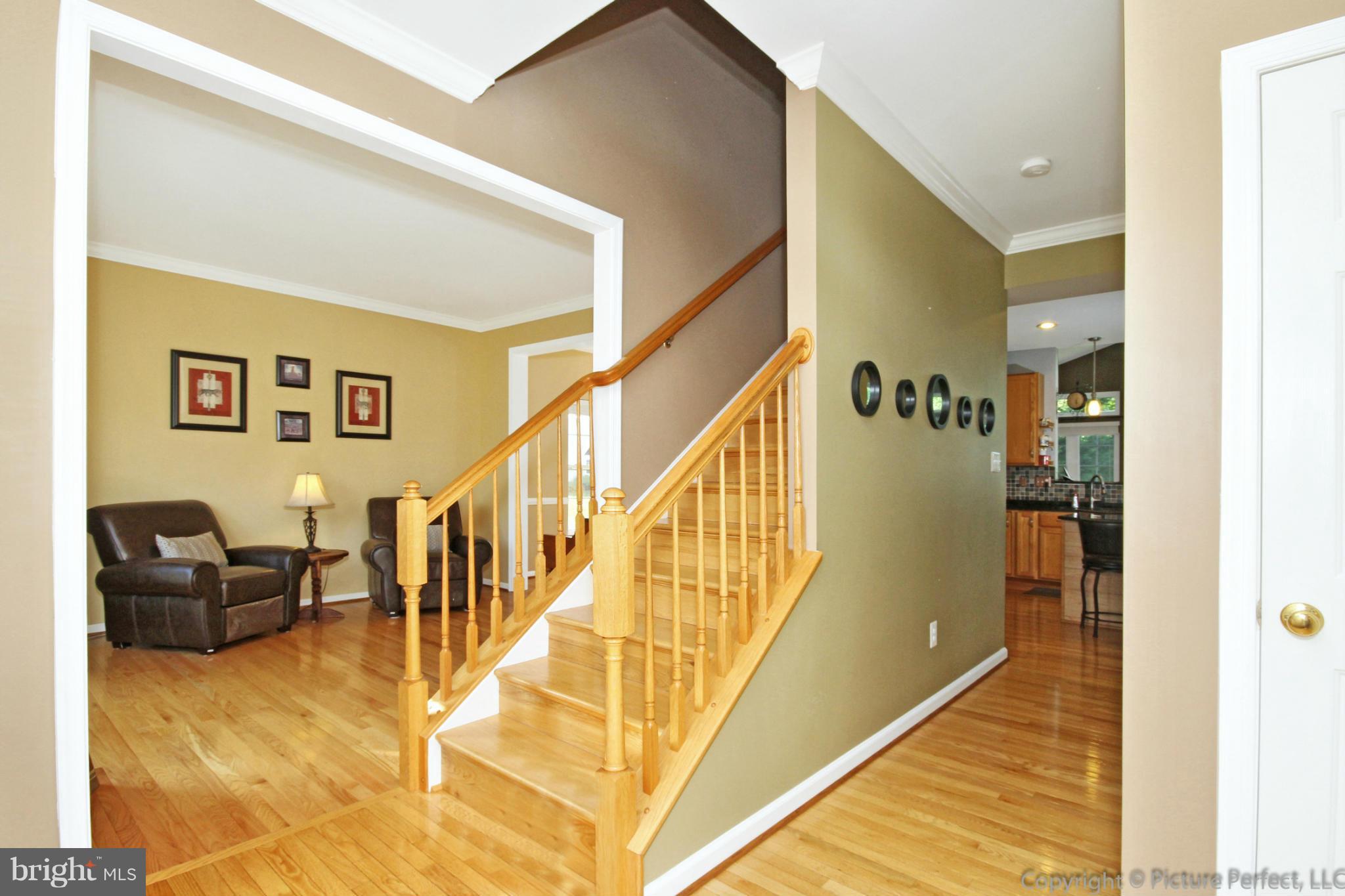 9014 Bealls Farm Road Frederick, MD 21704 - Photo 8 of 30 a view of livingroom with furniture and stairs