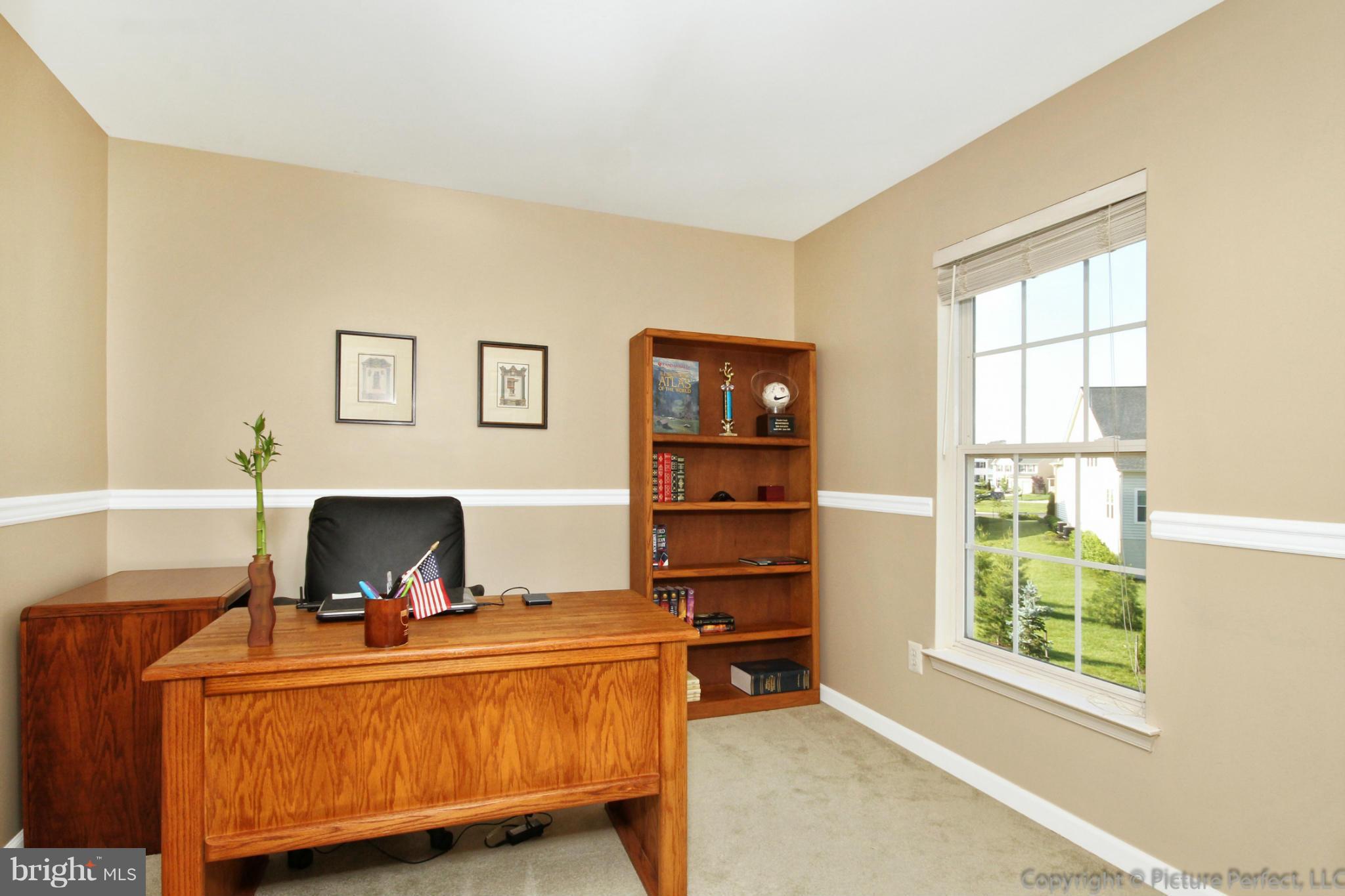 9014 Bealls Farm Road Frederick, MD 21704 - Photo 10 of 30 a living room with furniture and a window