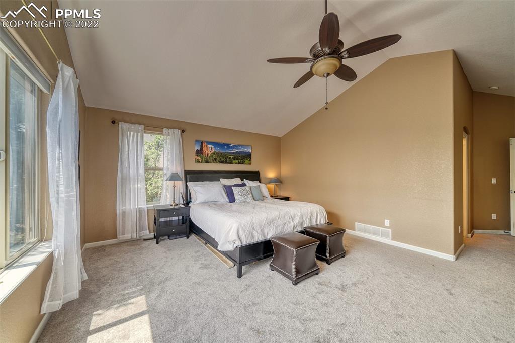 6205 Colfax Terrace Colorado Springs, CO 80906 - Photo 15 of 43 a bedroom with a bed and a window