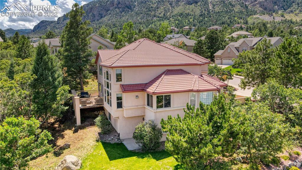 6205 Colfax Terrace Colorado Springs, CO 80906 - Photo 35 of 43 an aerial view of a house with yard porch and furniture