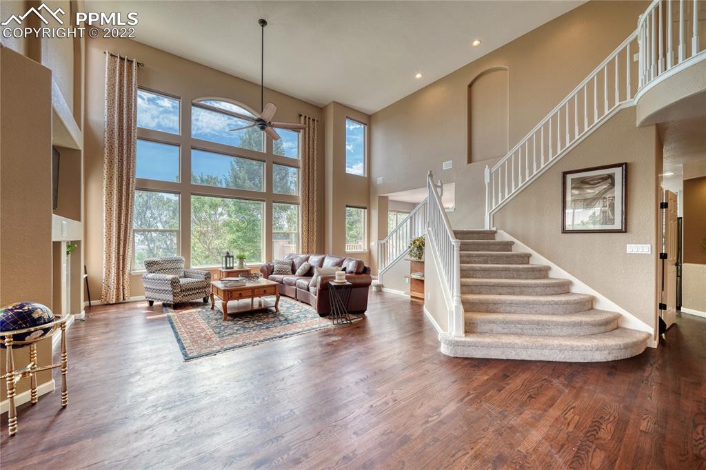 6205 Colfax Terrace Colorado Springs, CO 80906 - Photo 6 of 43 a living room with furniture and wooden floor