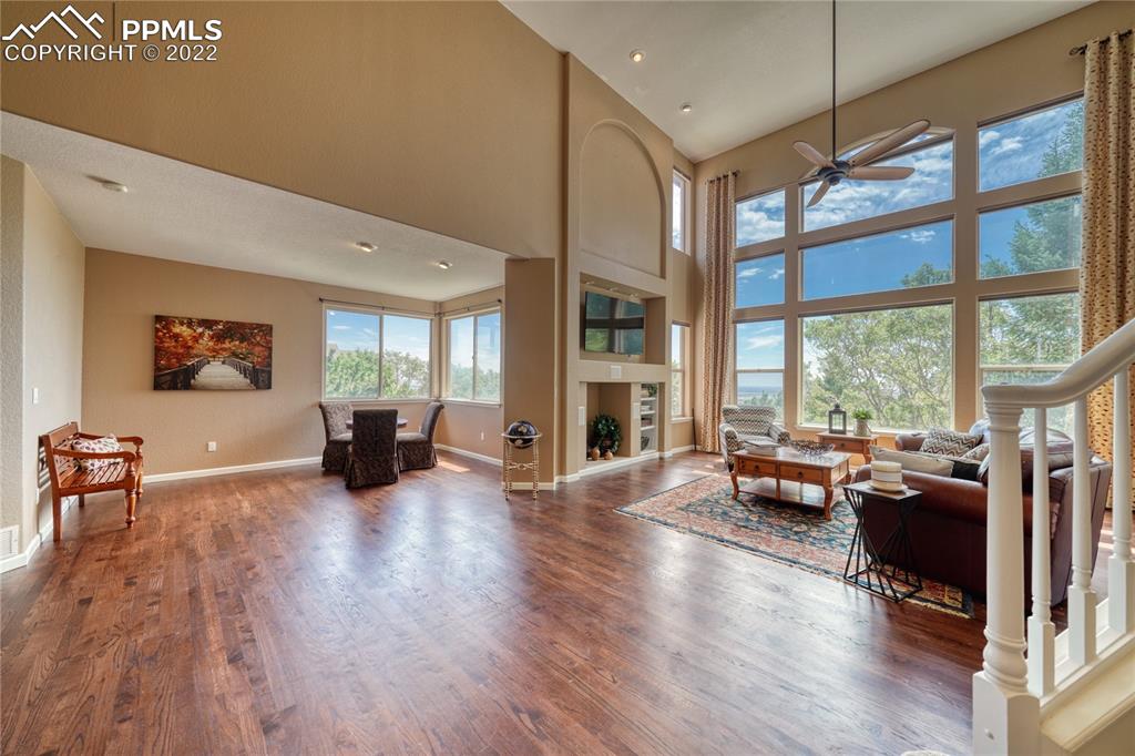 6205 Colfax Terrace Colorado Springs, CO 80906 - Photo 8 of 43 a living room with furniture large window and a flat screen tv