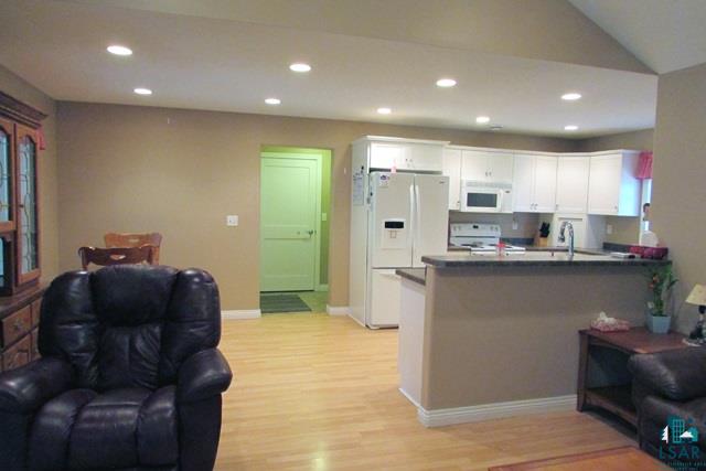 5481 Fawntrail Road Duluth, MN 55811 - Photo 14 of 22 Living Room to Kitchen