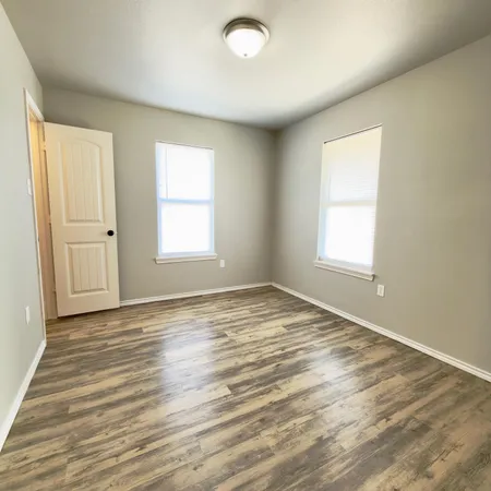an empty room with window