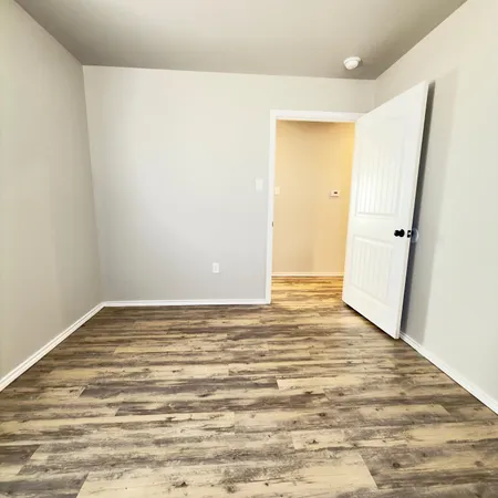 a view of a room with an empty space