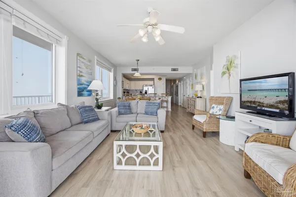 a balcony with table and chairs