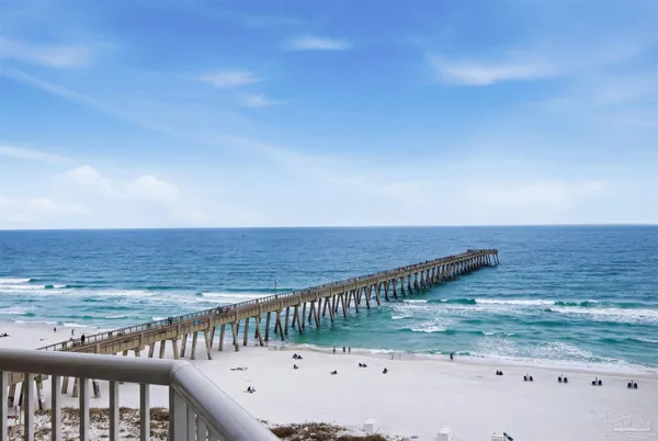 a view of a ocean with tall buildings