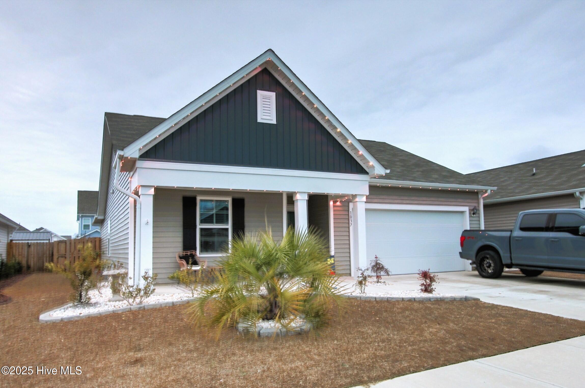1037 Course Lane Surf City, NC 28445 - Photo 1 of 33 Front