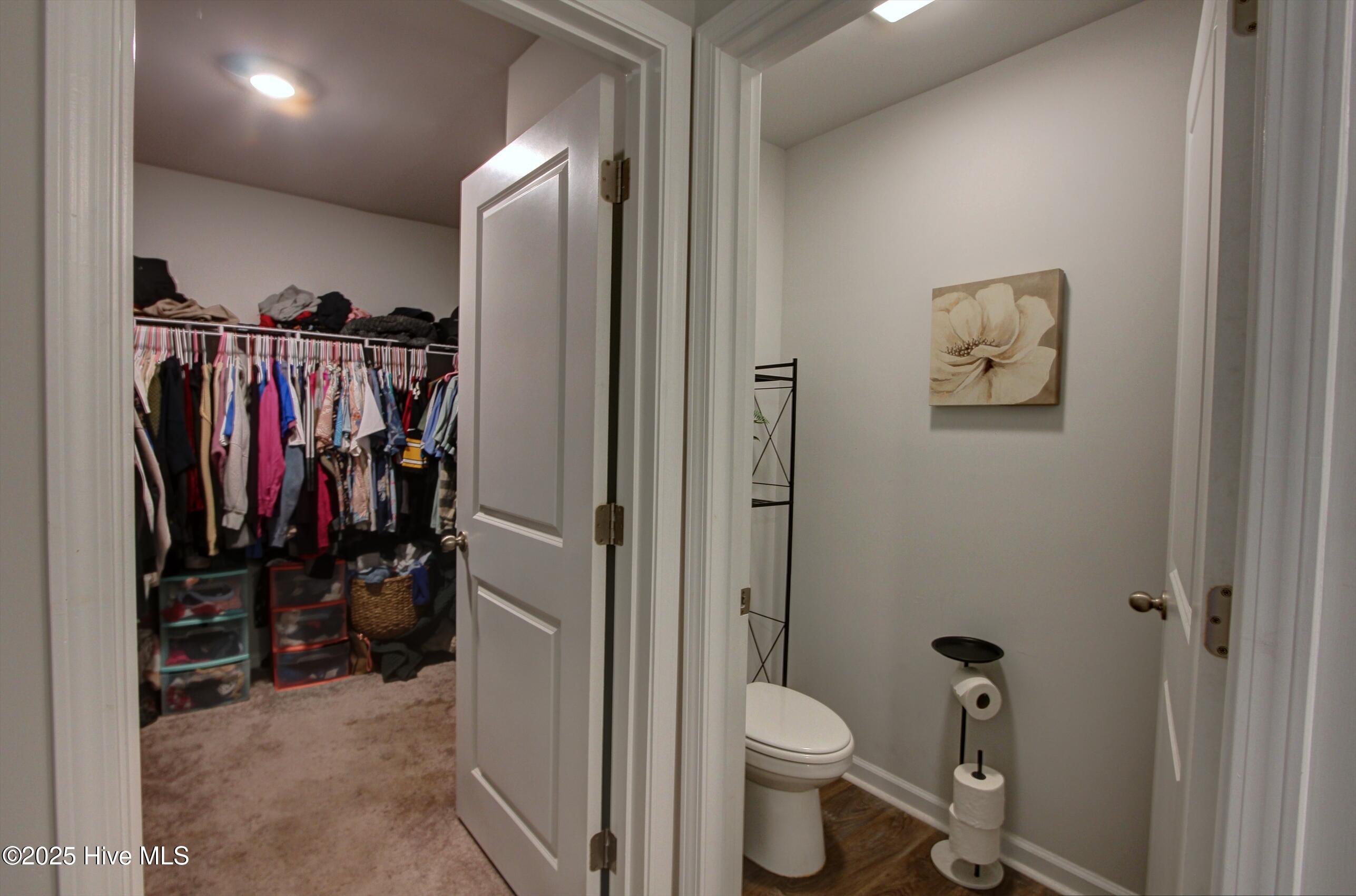 1037 Course Lane Surf City, NC 28445 - Photo 14 of 33 Walk-in Closet and Private Area in Primary Bath