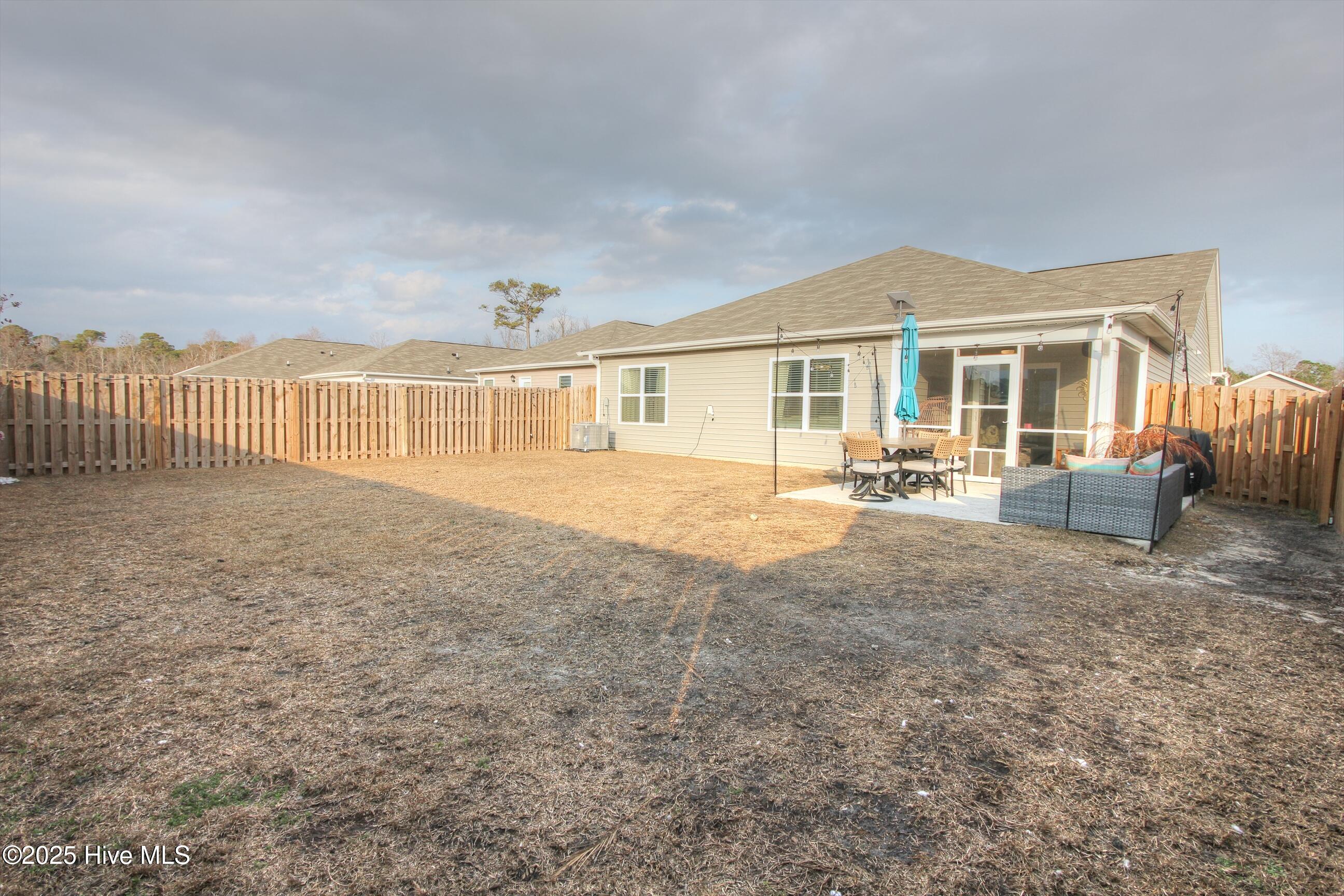 1037 Course Lane Surf City, NC 28445 - Photo 27 of 33 Back Yard