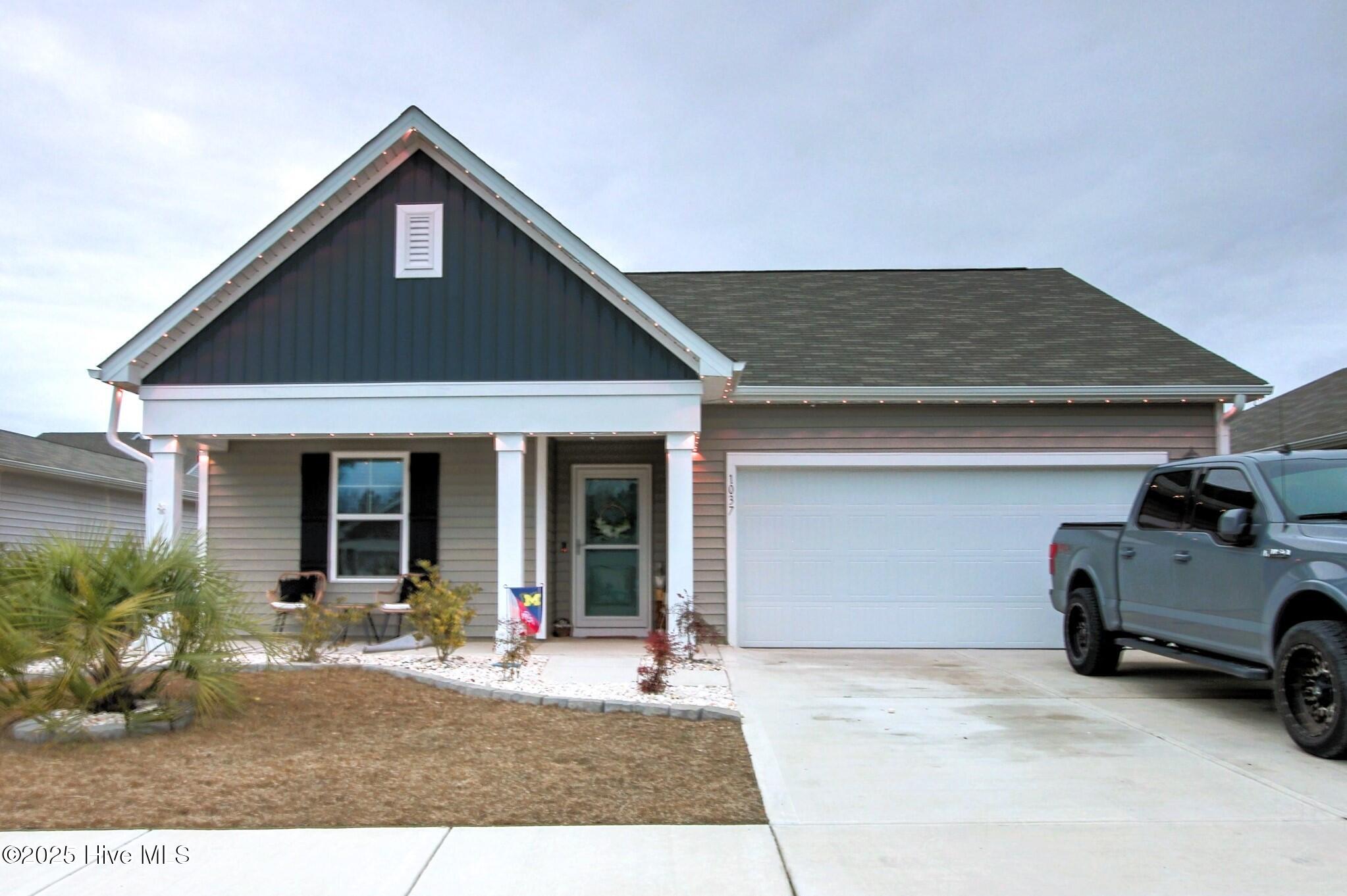 1037 Course Lane Surf City, NC 28445 - Photo 28 of 33 Front Yard and Driveway