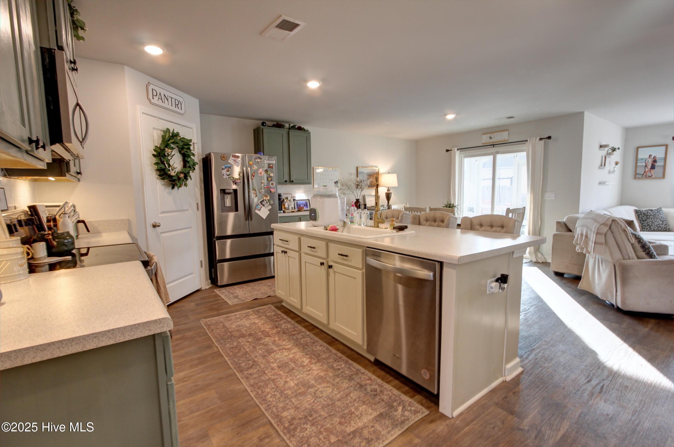 1037 Course Lane Surf City, NC 28445 - Photo 9 of 33 Kitchen
