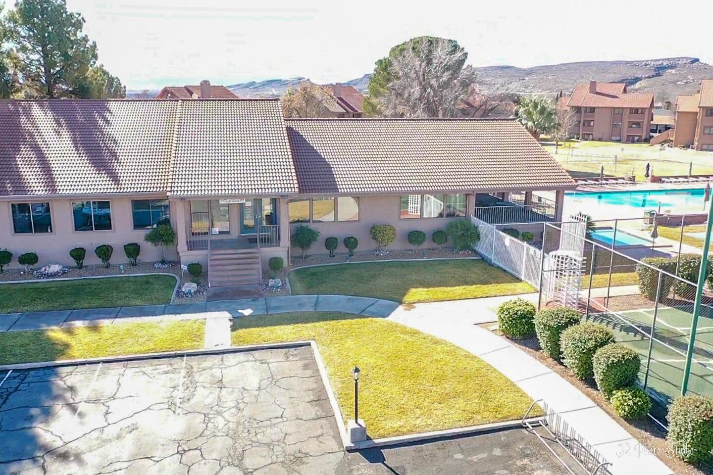 860 South Village Road, Unit B1 St. George, UT 84770 - Photo 26 of 36 25- Front of Clubhouse View 1