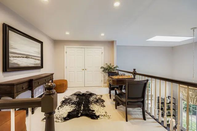 a workspace with furniture and window