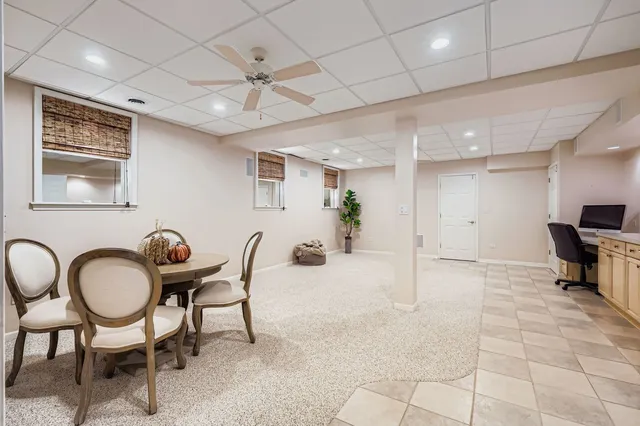 a view of a patio with table and chairs with wooden floor