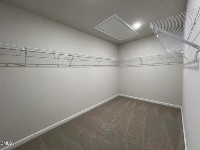 a view of a room with racks on the wall