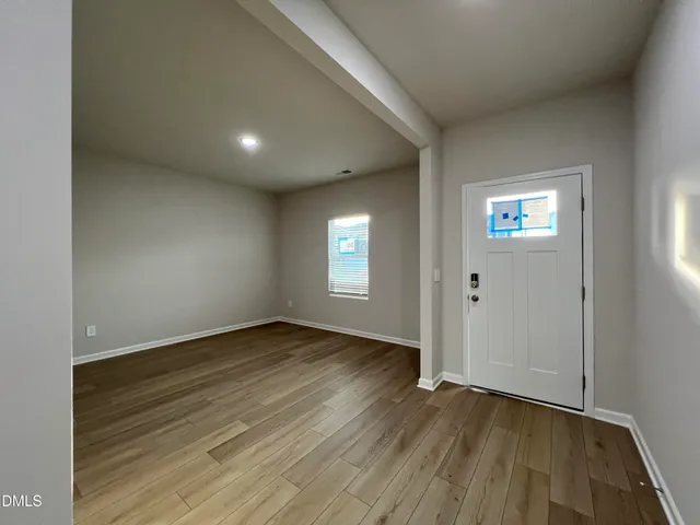 a black and white photo of a living room