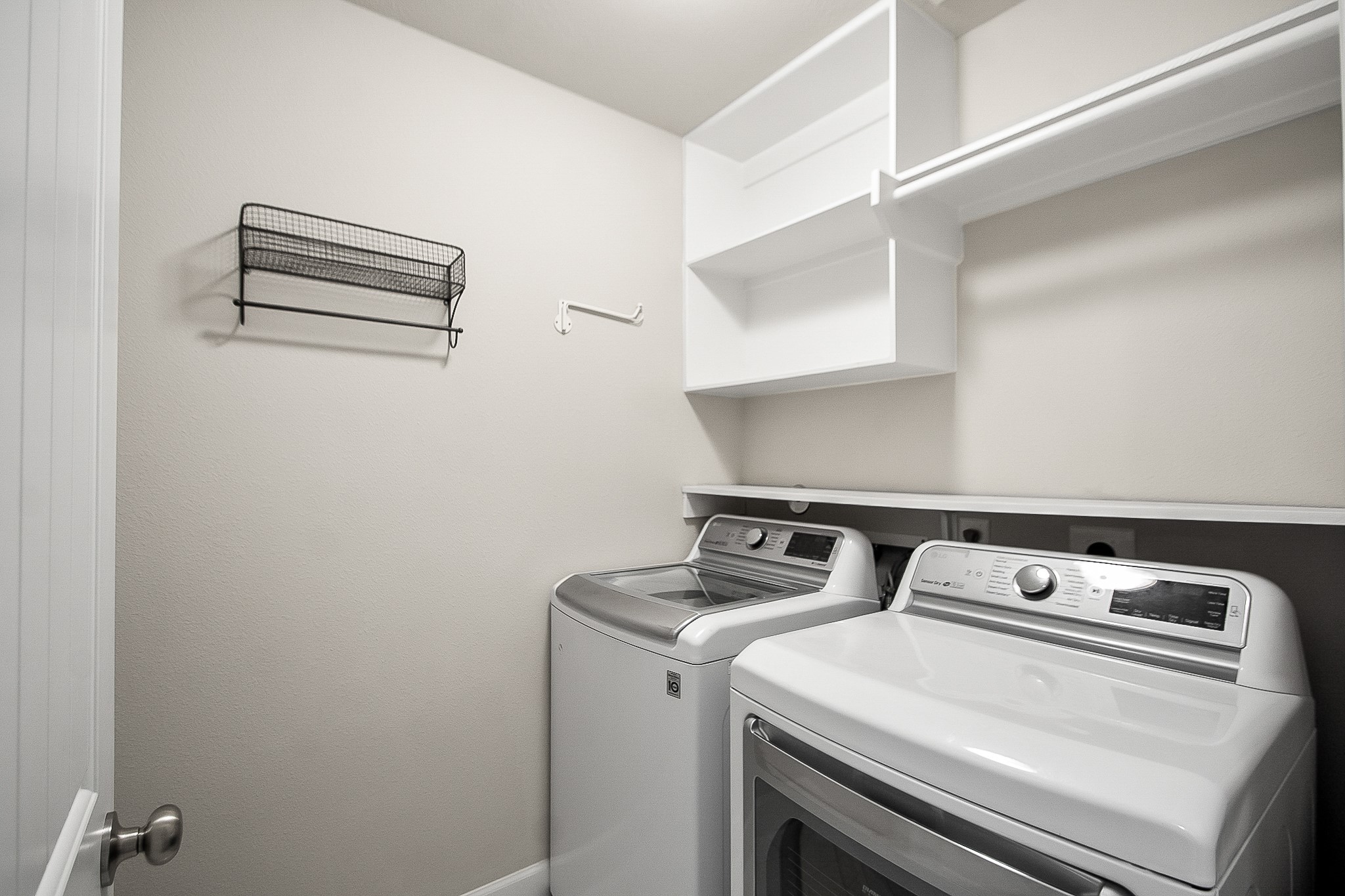 5328 Larkin Street Houston, TX 77007 - Photo 23 of 27 Dedicated laundry area thoughtfully positioned on the second floor
for everyday efficiency.