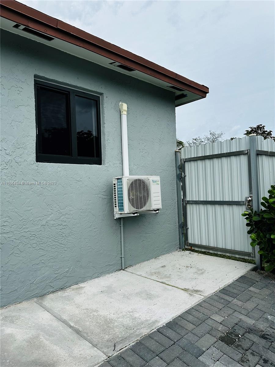 26232 Southwest 124th Place Homestead, FL 33032 - Photo 13 of 33 a house with a outdoor space