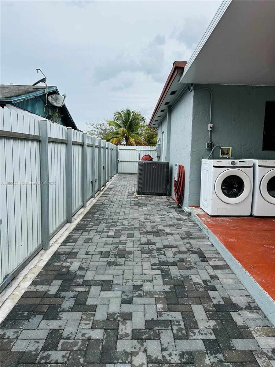 26232 Southwest 124th Place Homestead, FL 33032 - Photo 29 of 33 a view of a backyard of a house