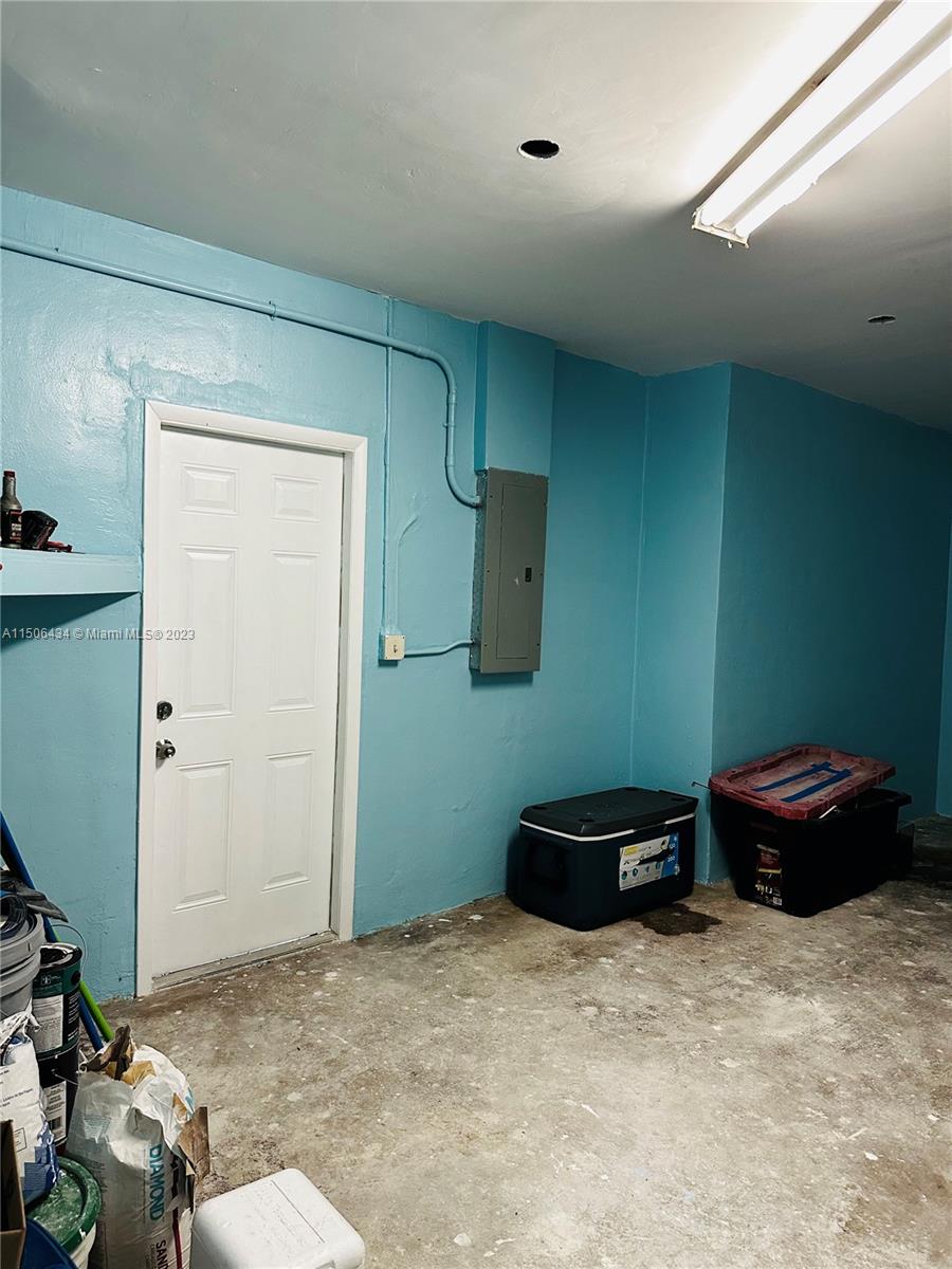 26232 Southwest 124th Place Homestead, FL 33032 - Photo 33 of 33 a bedroom with a bed and a air conditioner vent