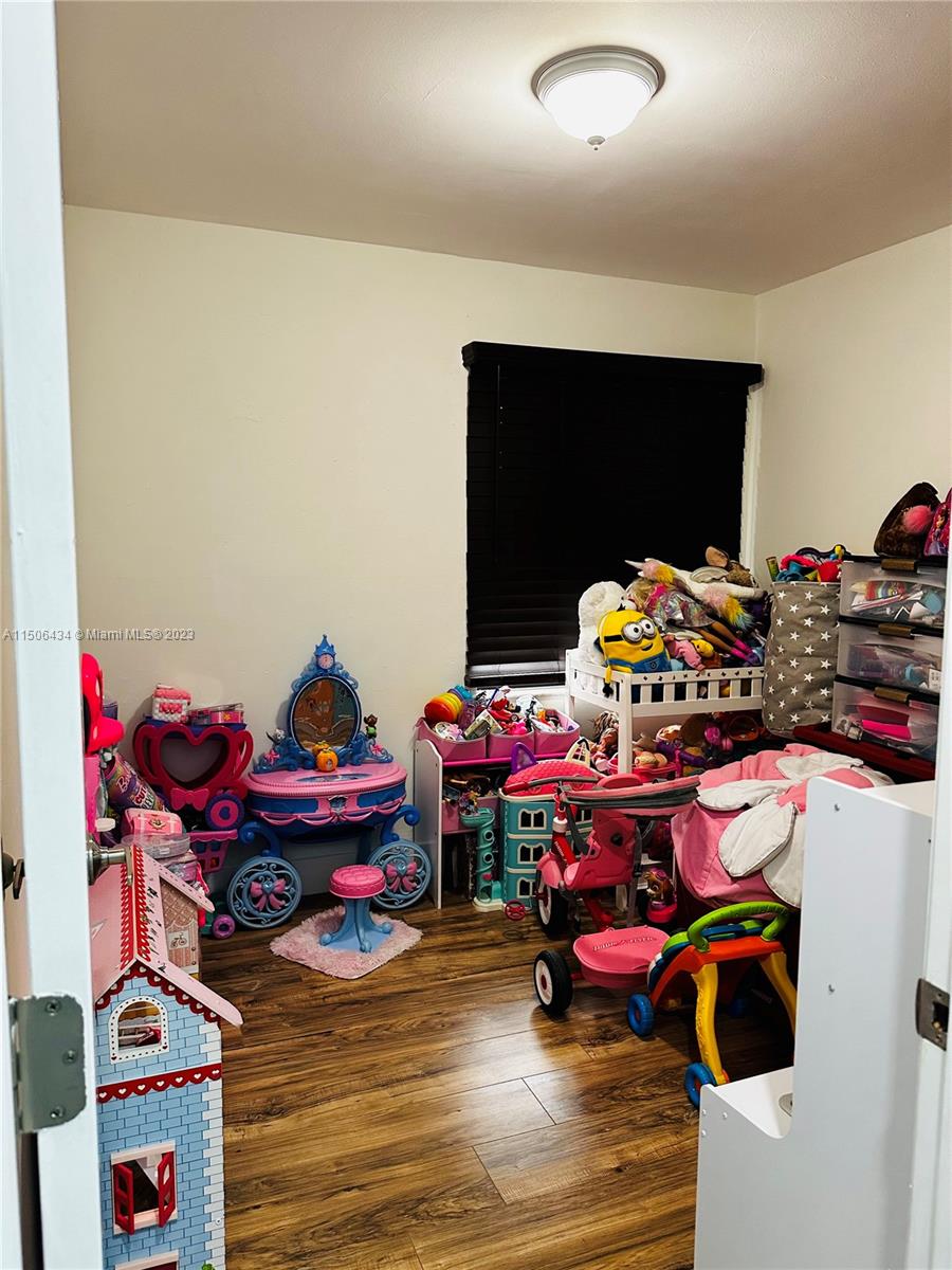 26232 Southwest 124th Place Homestead, FL 33032 - Photo 8 of 33 a play room with toys