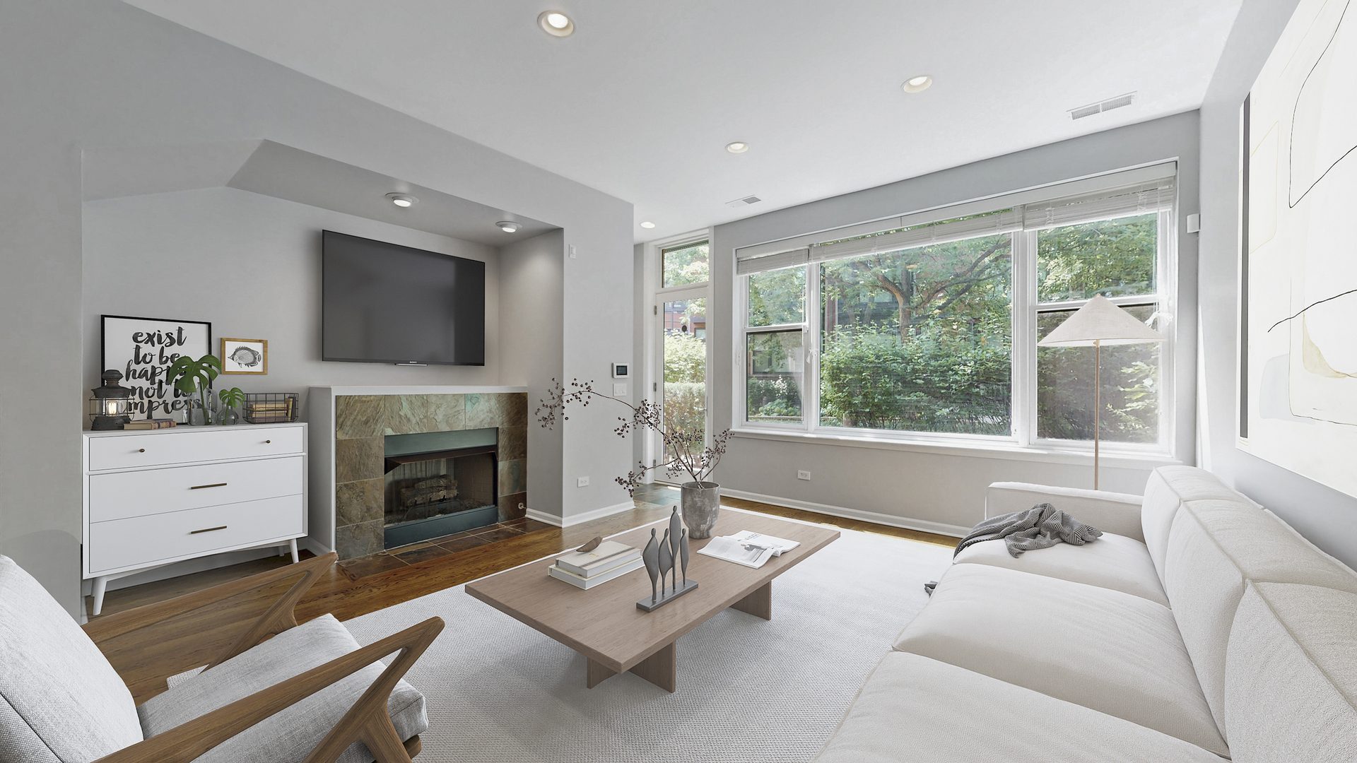 915 North Howe Street Chicago, IL 60610 - Photo 5 of 30 a living room with furniture a fireplace and a flat screen tv