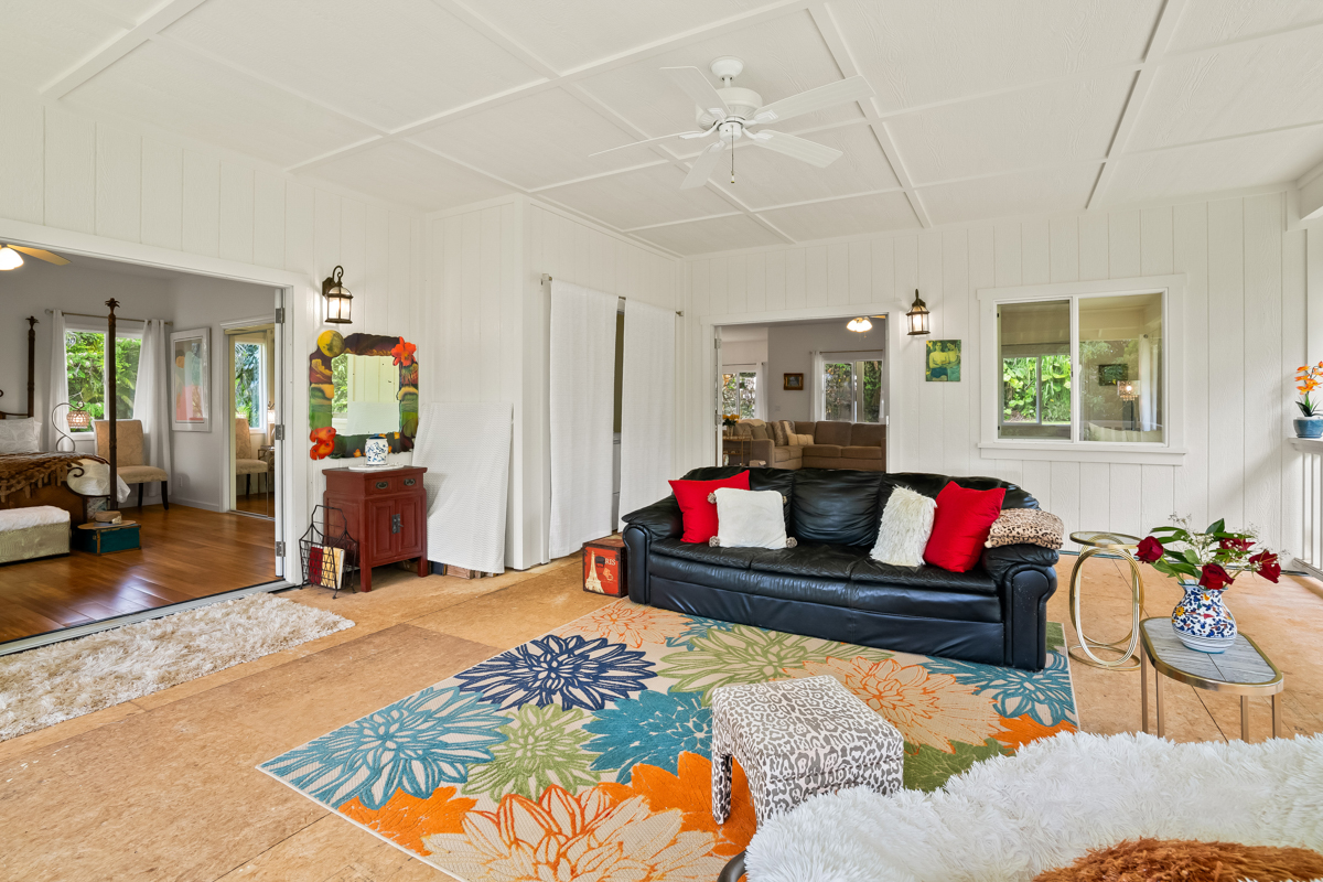 6390 Kalama Road Kapaa, HI 96746 - Photo 11 of 21 a living room with furniture and a wooden floor