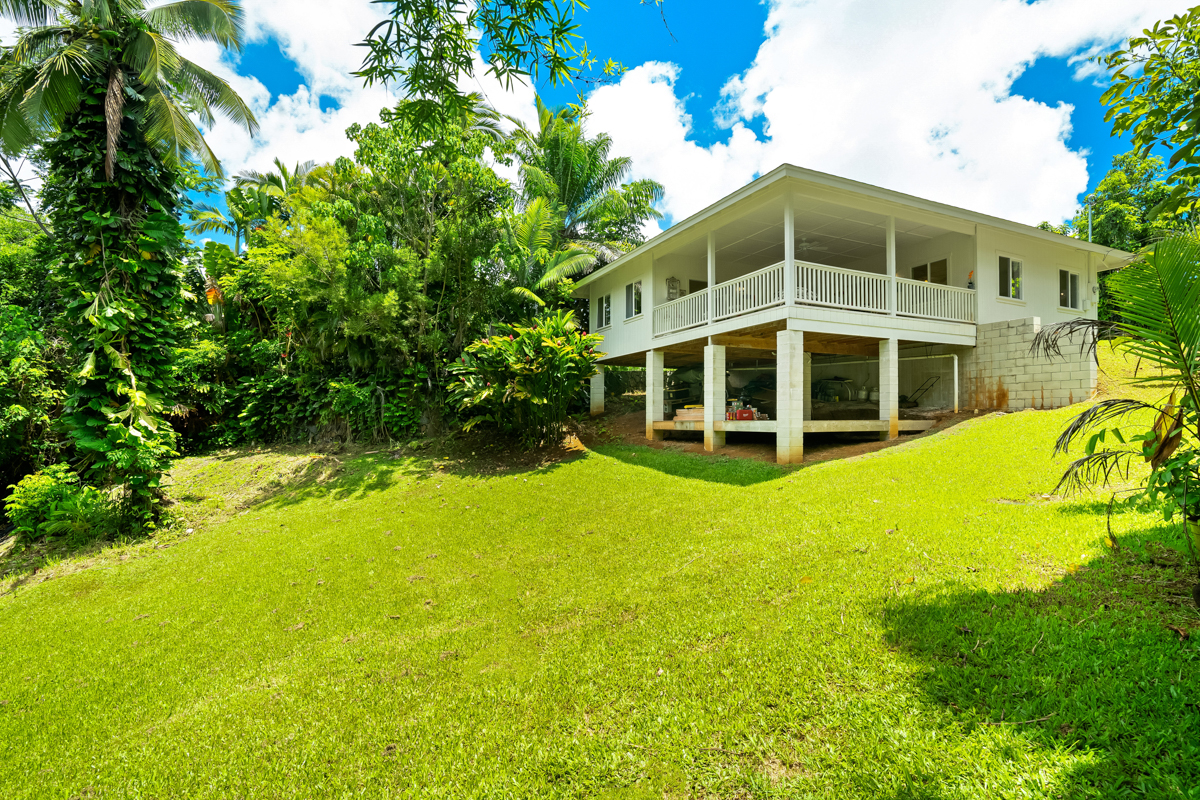 6390 Kalama Road Kapaa, HI 96746 - Photo 12 of 21 a view of a house with a yard