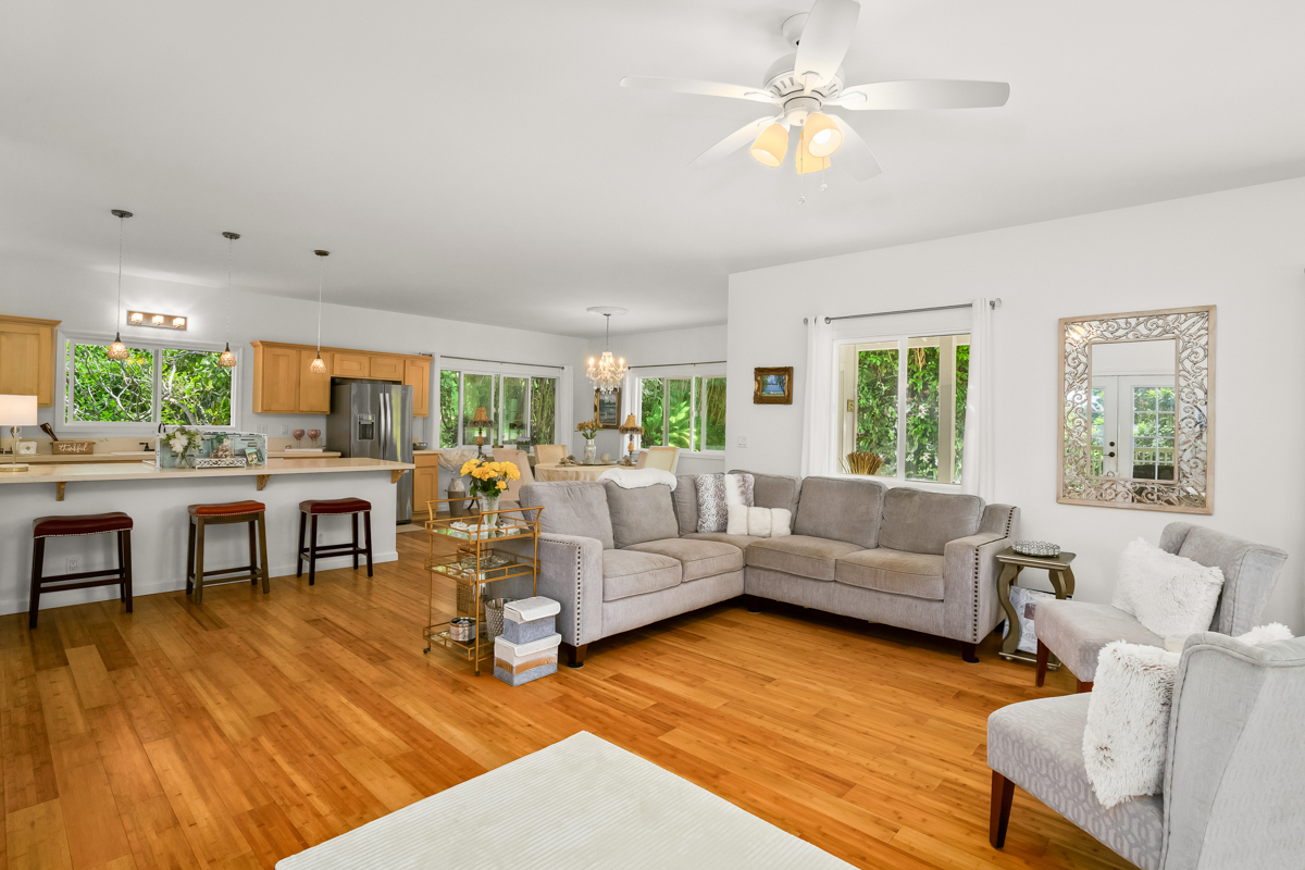 6390 Kalama Road Kapaa, HI 96746 - Photo 5 of 21 a living room with furniture and a fireplace