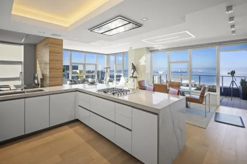 a kitchen with counter top space and appliances