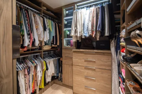 a bathroom with a granite countertop sink mirror and double