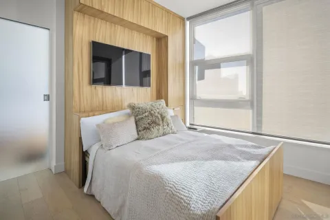 a bathroom with a sink mirror bathtub and toilet