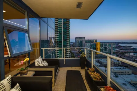 a view of a city skyline from a balcony