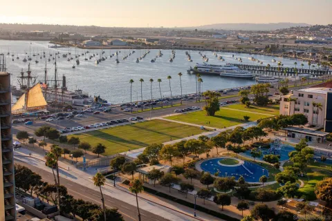 a view of a swimming pool with a lawn chairs