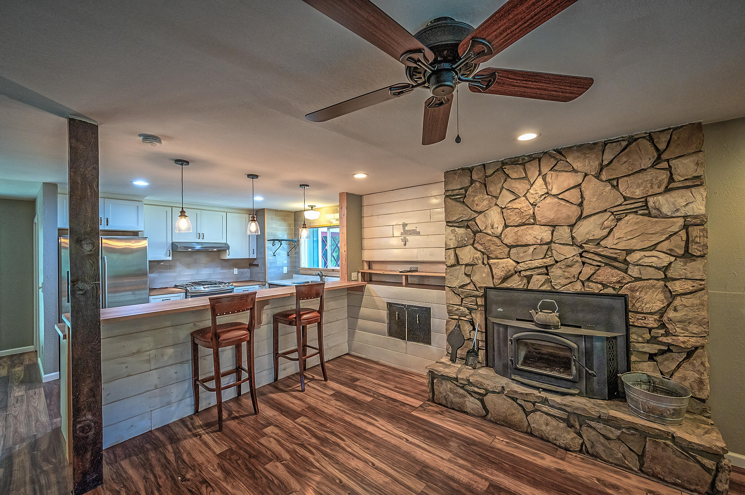 1765 Goose Ranch Road Lewiston, CA 96052 - Photo 25 of 83 a kitchen with stainless steel appliances granite countertop a stove a sink and a refrigerator