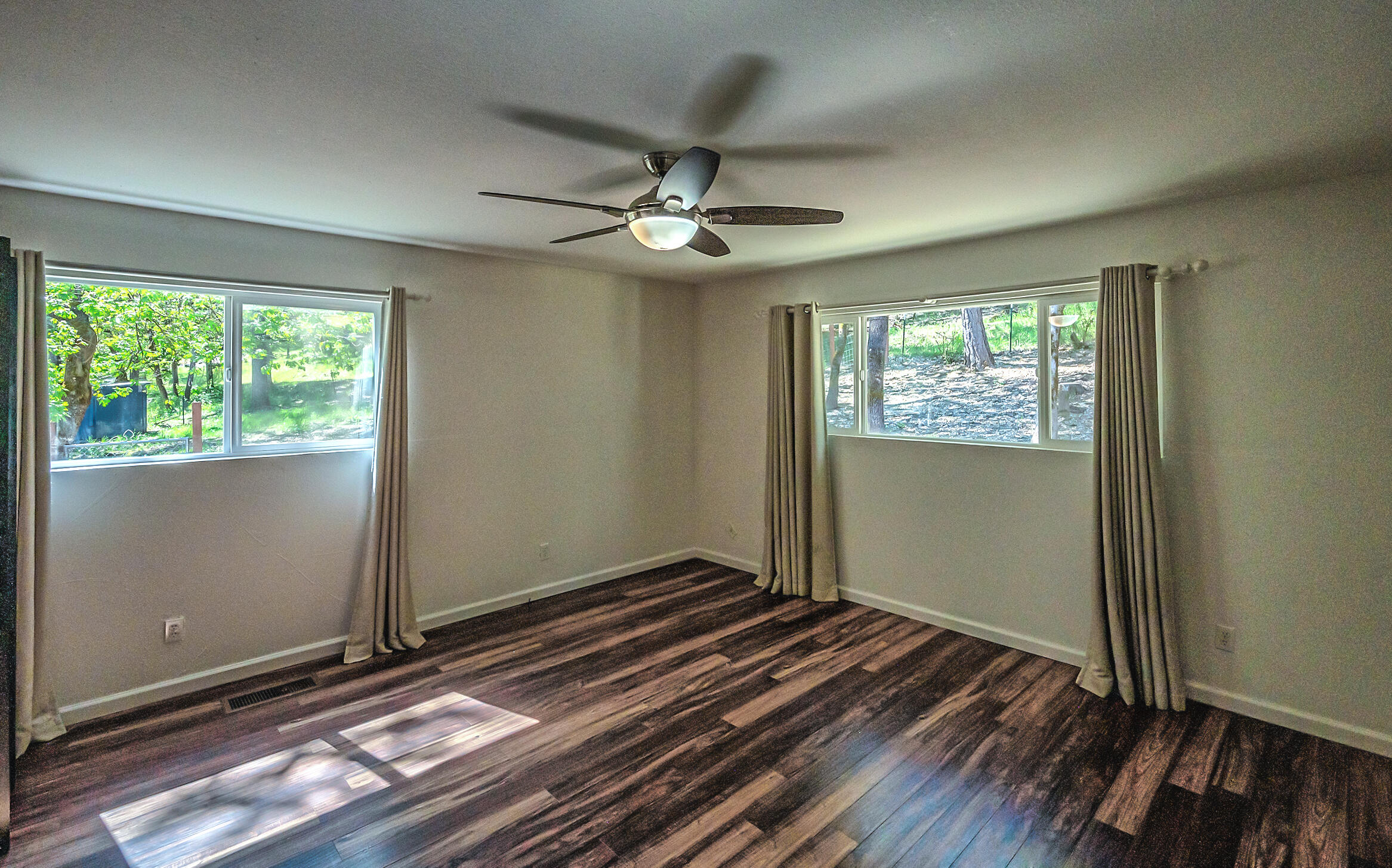 1765 Goose Ranch Road Lewiston, CA 96052 - Photo 28 of 83 a view of room with window ceiling fan and hardwood floor