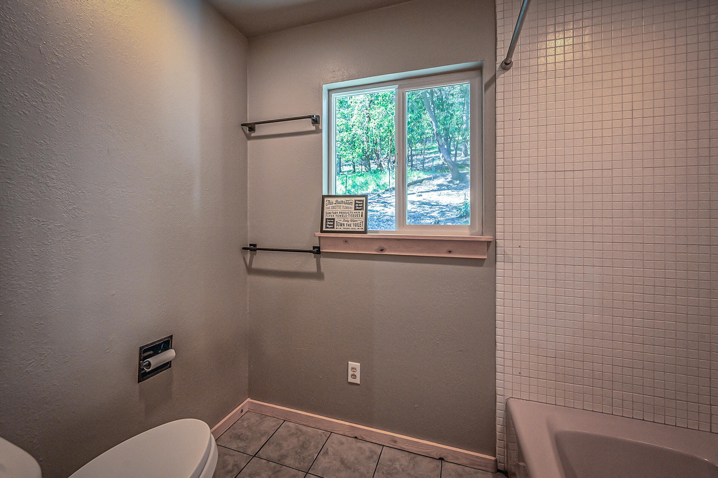 1765 Goose Ranch Road Lewiston, CA 96052 - Photo 34 of 83 a bathroom with a toilet a sink and shower