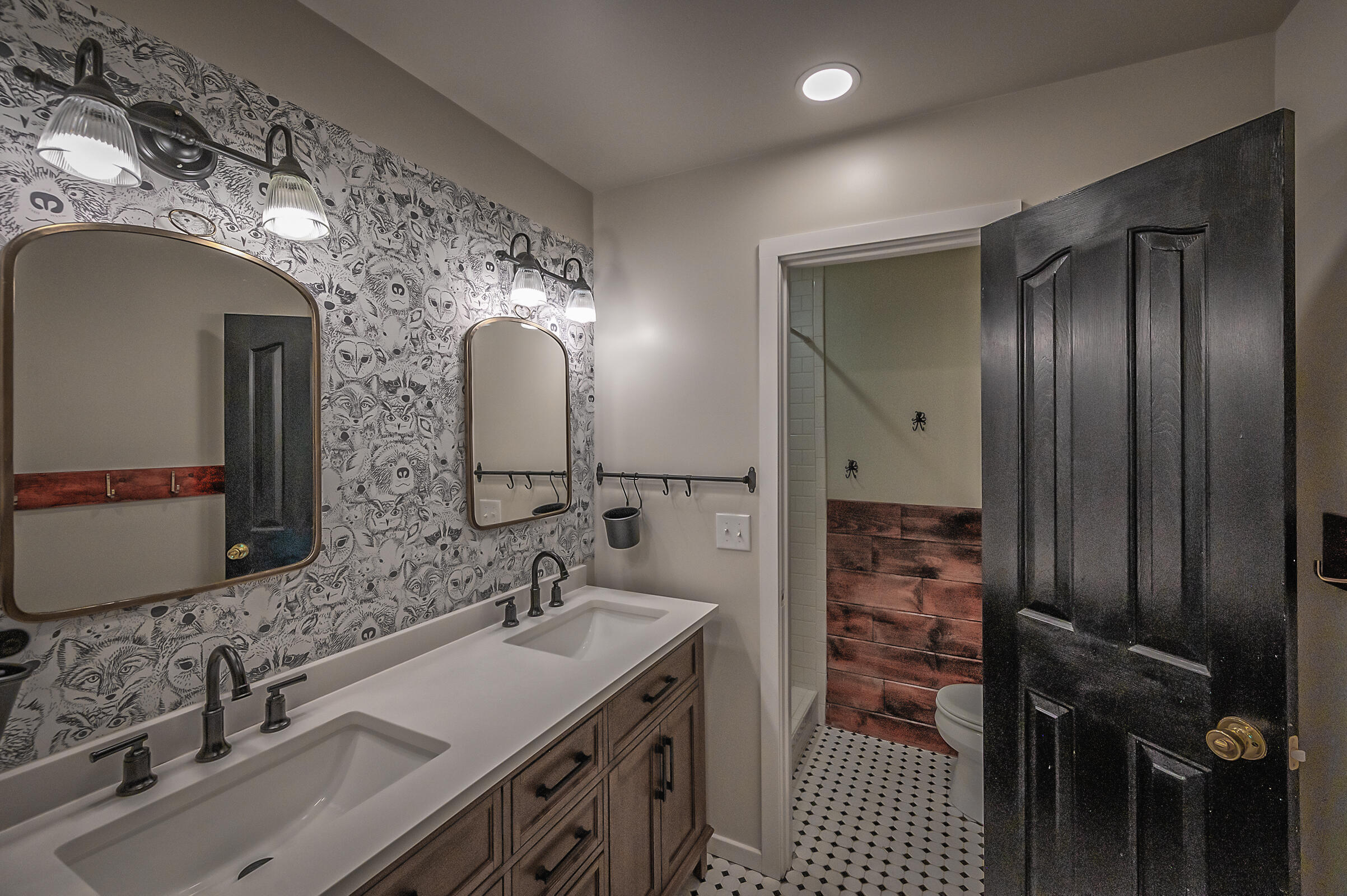 1765 Goose Ranch Road Lewiston, CA 96052 - Photo 38 of 83 a bathroom with a double vanity sink and a mirror