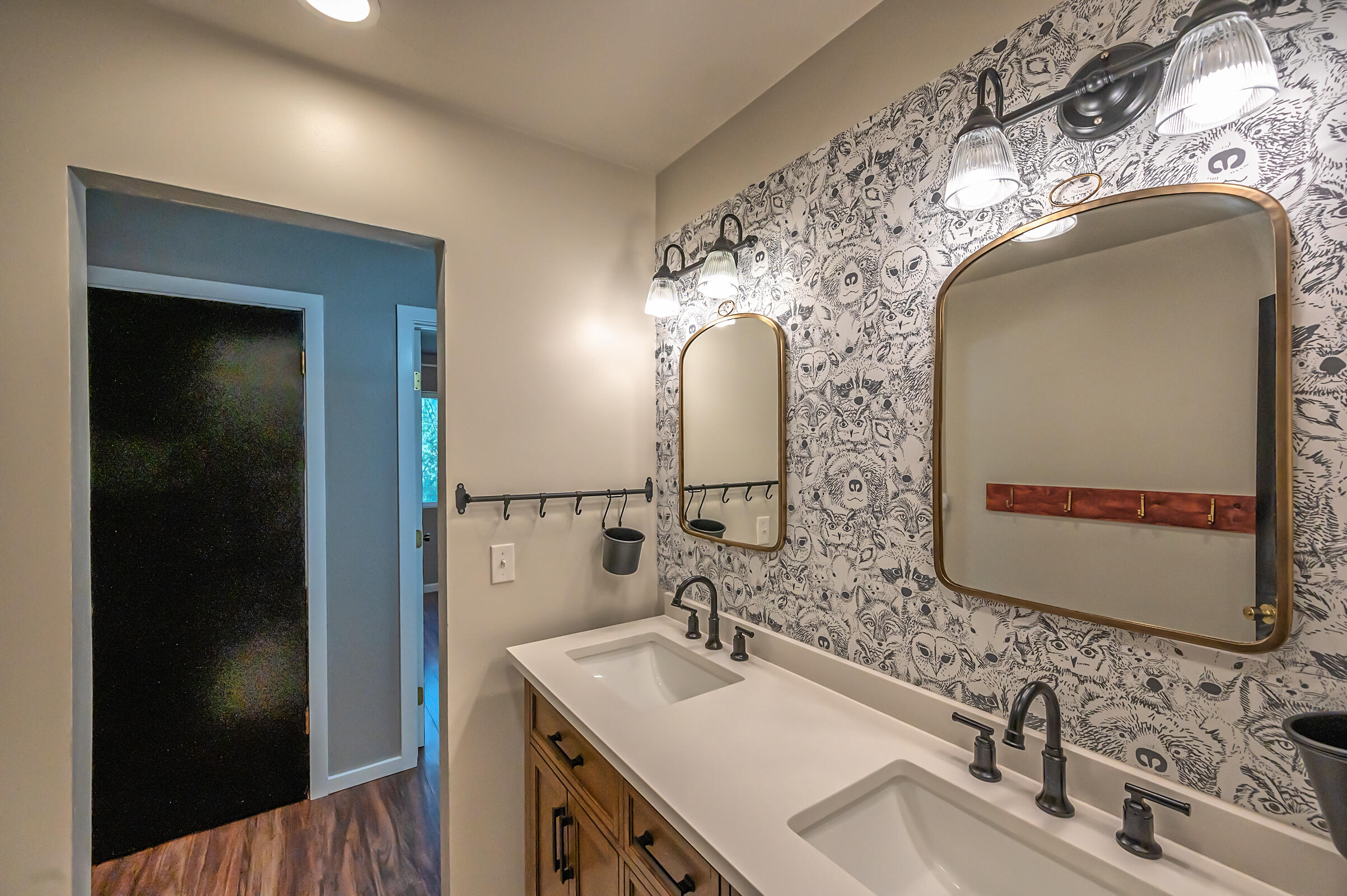 1765 Goose Ranch Road Lewiston, CA 96052 - Photo 40 of 83 a bathroom with a double vanity sink and a mirror