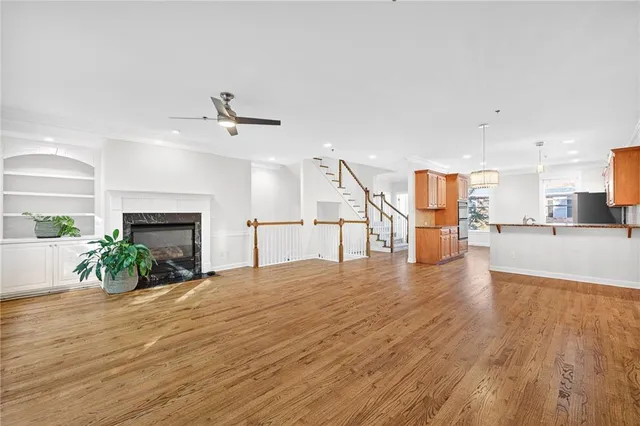 a view of a kitchen with furniture and a fireplace