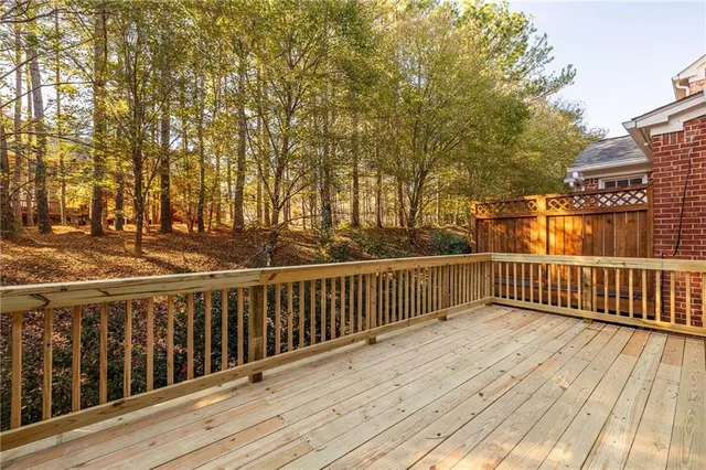 a view of a wooden roof deck