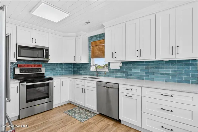 $1,100,000 | 1120 East Beach Drive, Oak Island, NC 28465