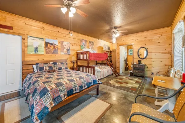 a bathroom with a toilet sink and shower