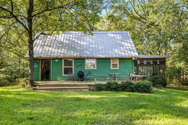 a house view with a garden space
