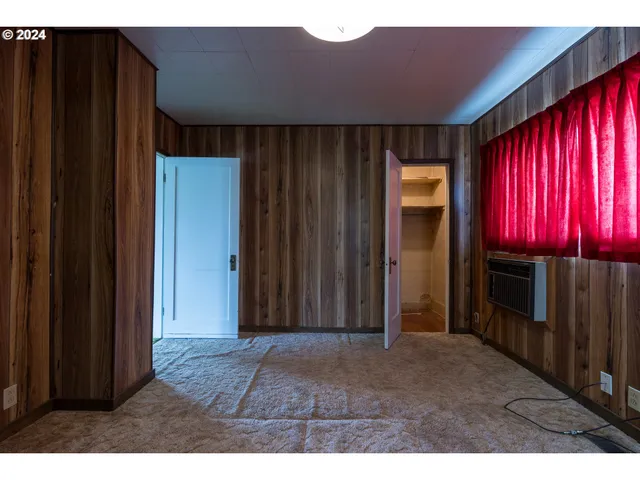 a view of a house with red door