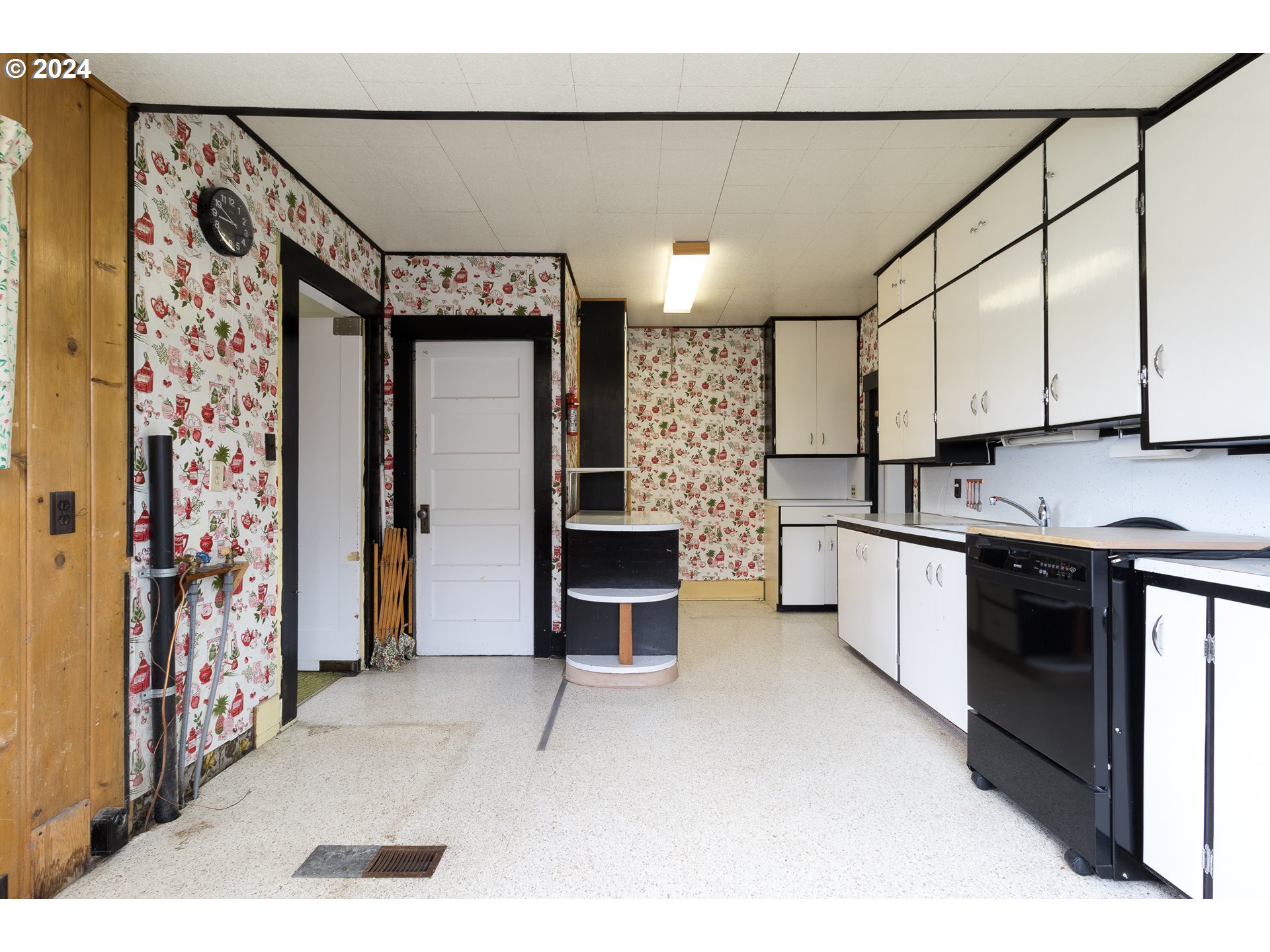644 South Main Street Milton Freewater, OR 97862 - Photo 6 of 24 a kitchen with stainless steel appliances kitchen island granite countertop a refrigerator and a stove top oven