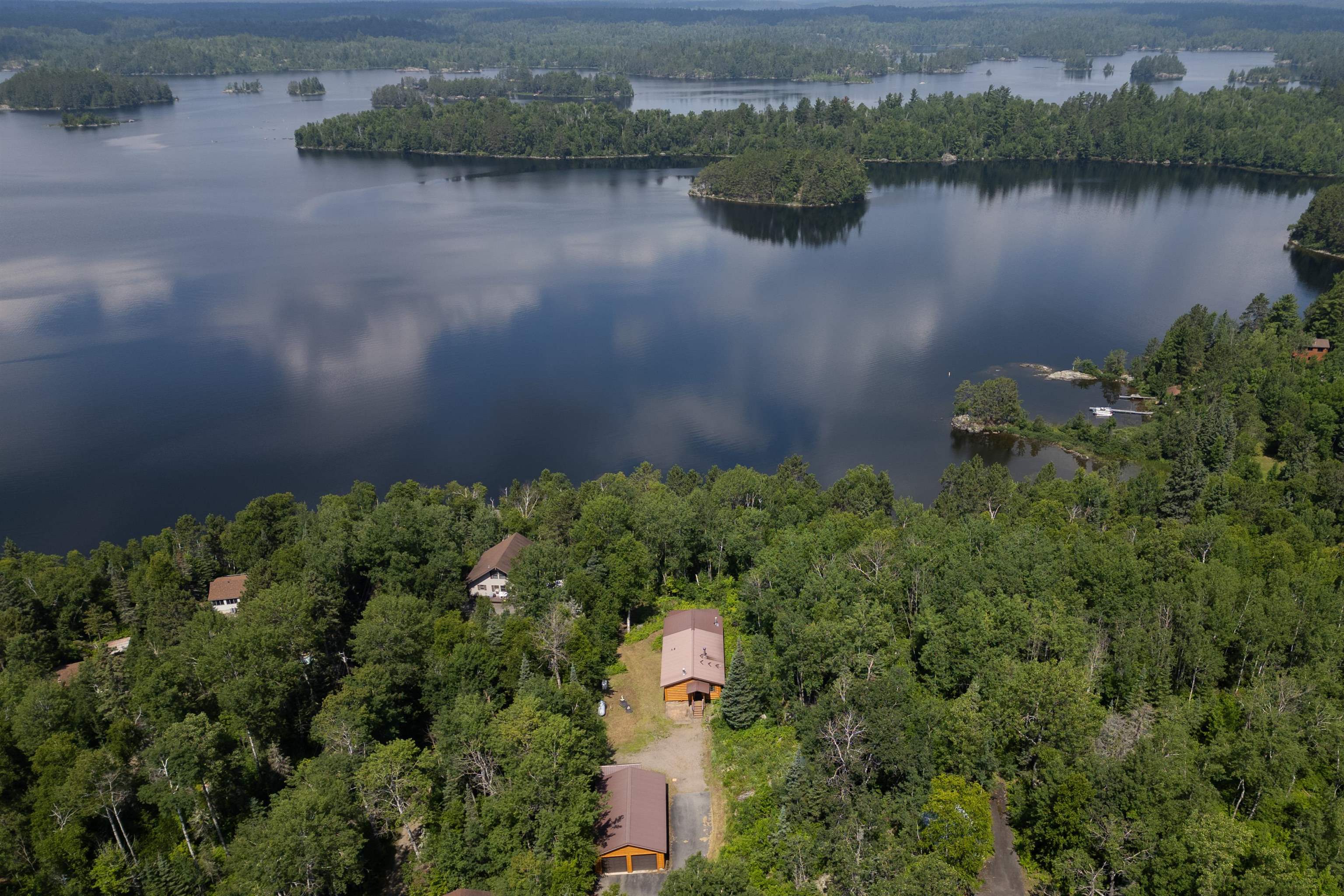 3055 Van Vac Road Ely, MN 55731 - Photo 55 of 58 Drone / aerial view of a heavily wooded area and a large body of water